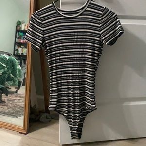 Black and white striped body suit